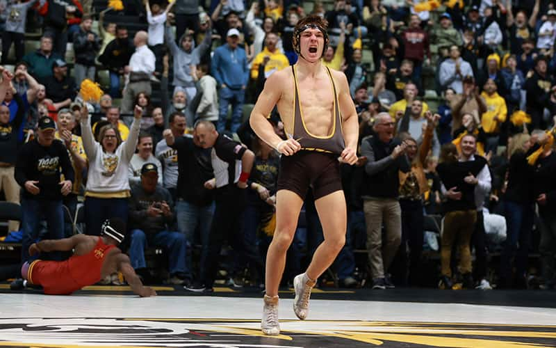 Brock Mauller (Missouri) celebrates after pinning Paniro Johnson (Iowa State)