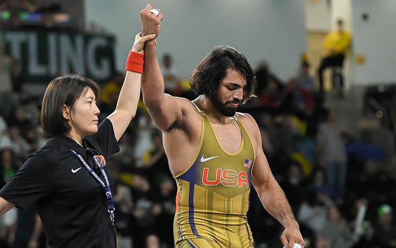 Zahid Valencia (USA) has arm raised in victory at 2022 World Cup.