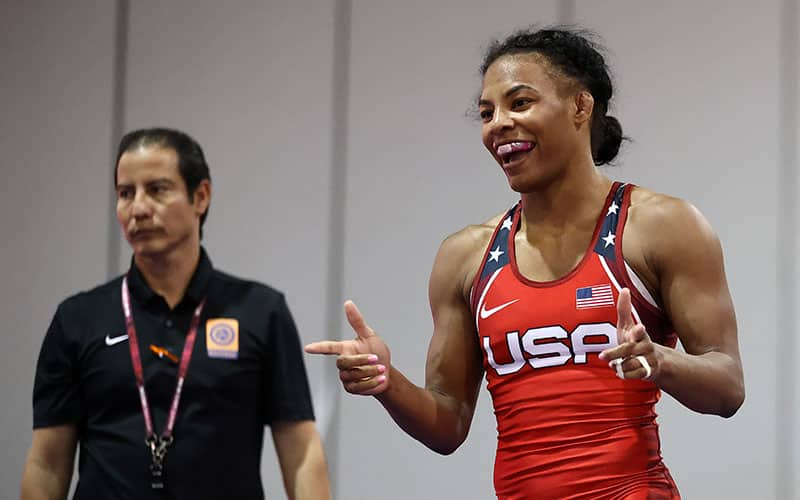 Jacarra Winchester (USA) celebrates after winning a match by pointing her guns