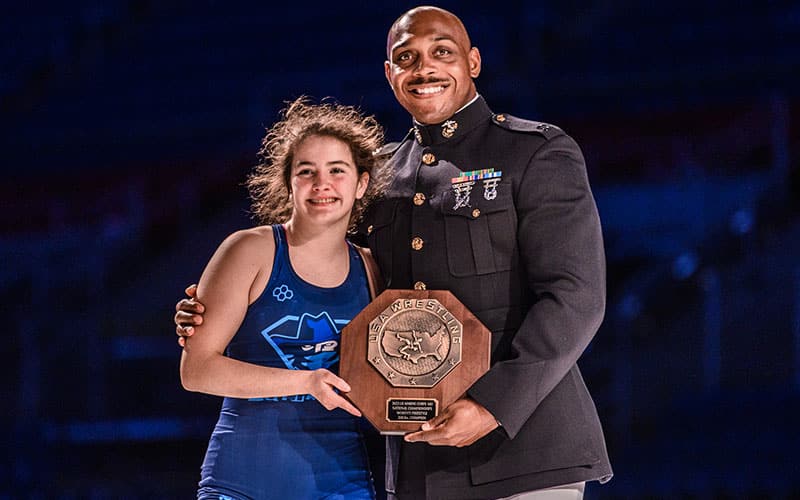 Bella Williams of Oklahoma receives her USA Wrestling national champion stop sign. Williams was named 16U Outstanding Wrestler