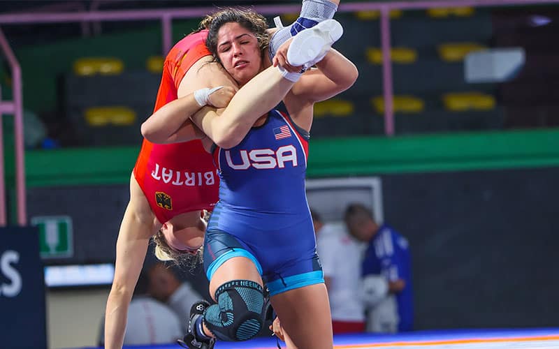 Marilyn Garcia (USA) goes for takedown against Schell (Germany)
