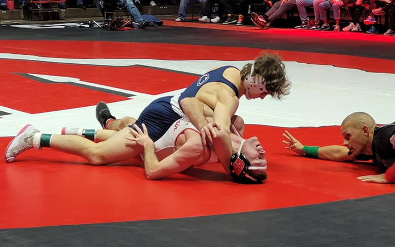 Levi Haines (Penn State) works for a fall.