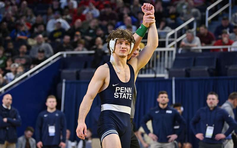 Levi Haines (Penn State) with arm raised in victory.