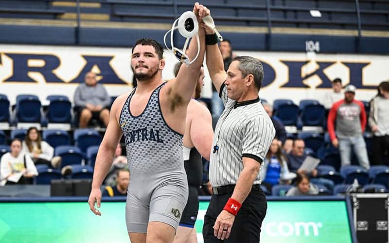 Shawn Streck (Central Oklahoma) has arm raised in victory