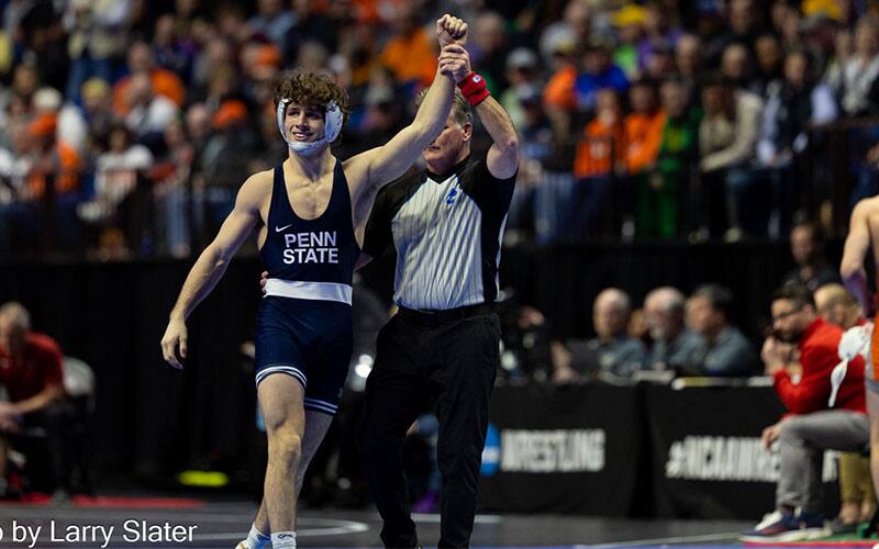 Levi Haines (Penn State) with arm raised after quarterfinals win