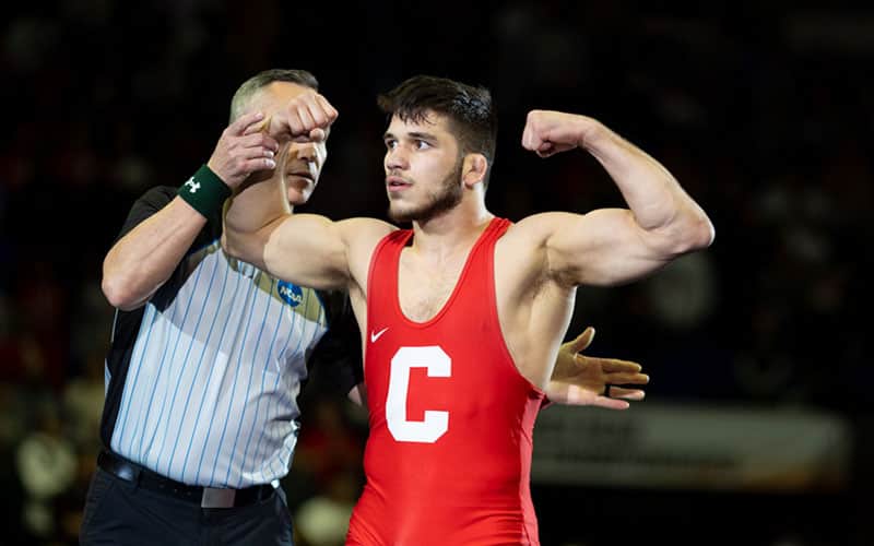 Yianni Diakomihalis flexes after winning fourth NCAA title