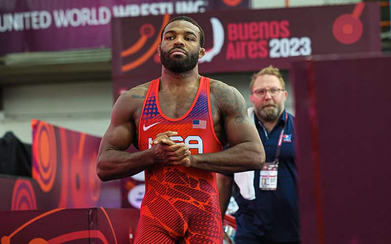 Jordan Burroughs (USA), with coach Brandon Slay, entering the field of play at the 2023 Pan American Championships.