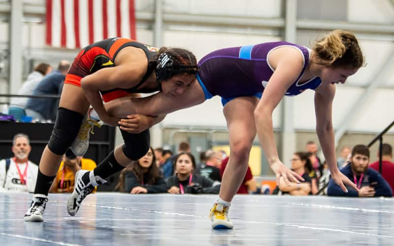 Taina Fernandez (MD) scores a takedown at the Women's 14U Nationals in Spokane.