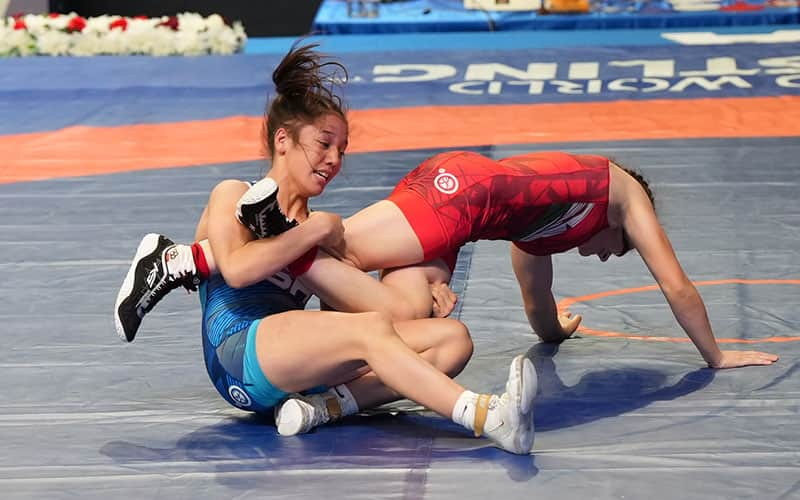 Karlee Brooks (USA) works an ankle lace in her repechage match at U17 World Championships.