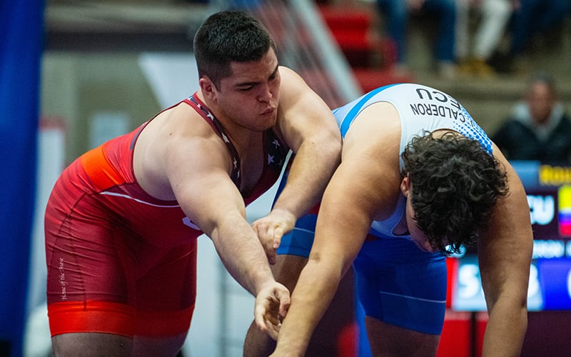 Aden Attao (red singlet) at the U20 Pan-American Championships. Photo by Richard Immel.