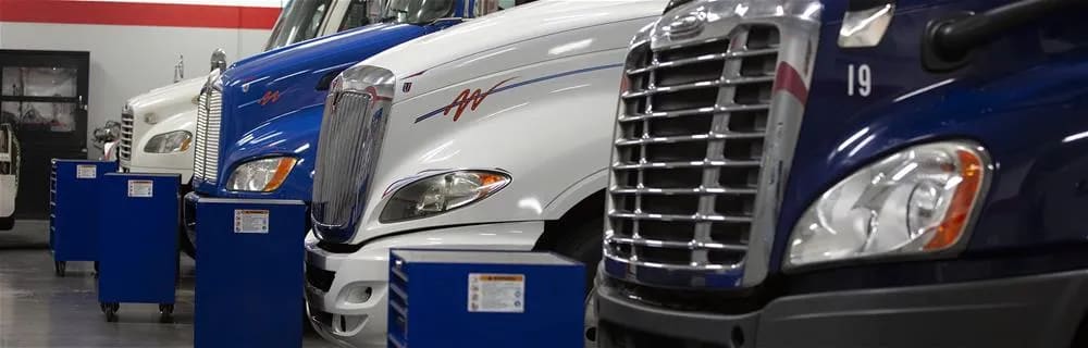 Diesel trucks awaiting inspection and repair at UTI labs