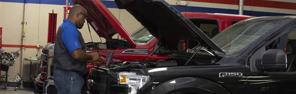 Student working on a Ford truck.