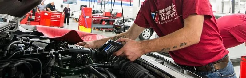 Mechanic working on engine