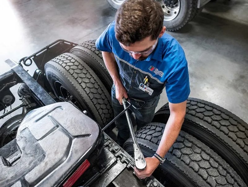 Diesel student works on a vehicle in a UTI lab.