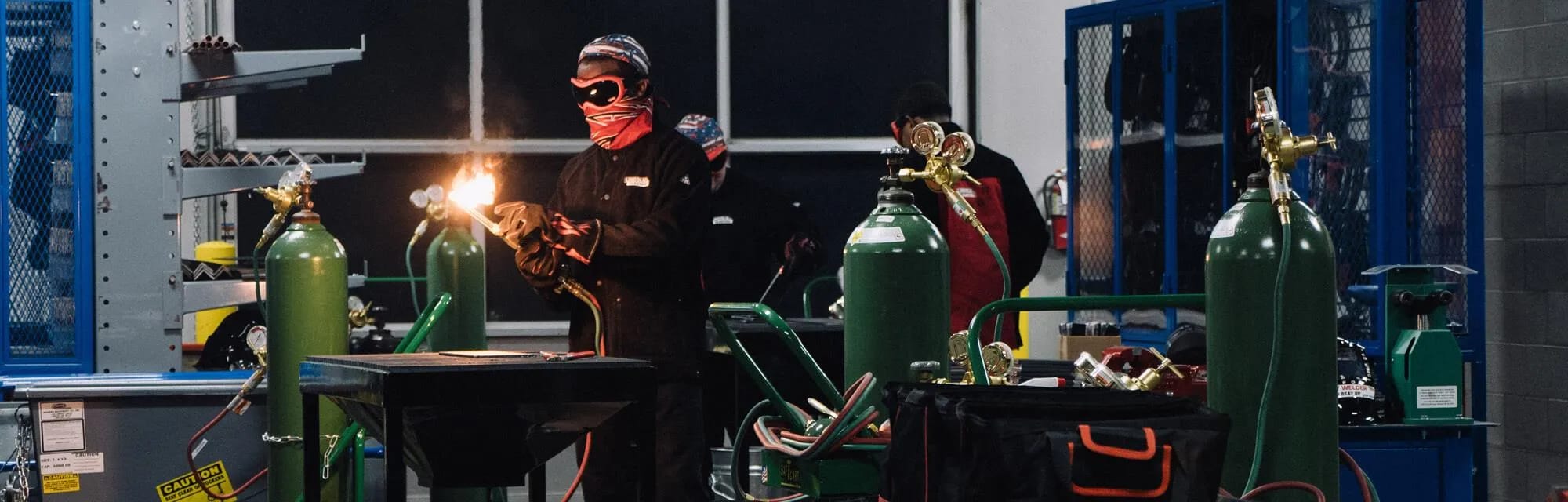 Welder lighting torch in lab