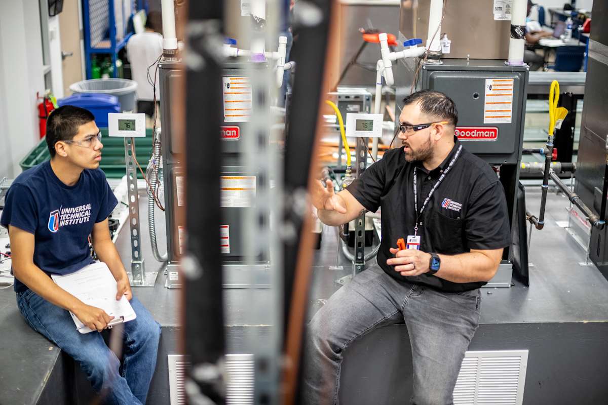 Faculty interacting with student