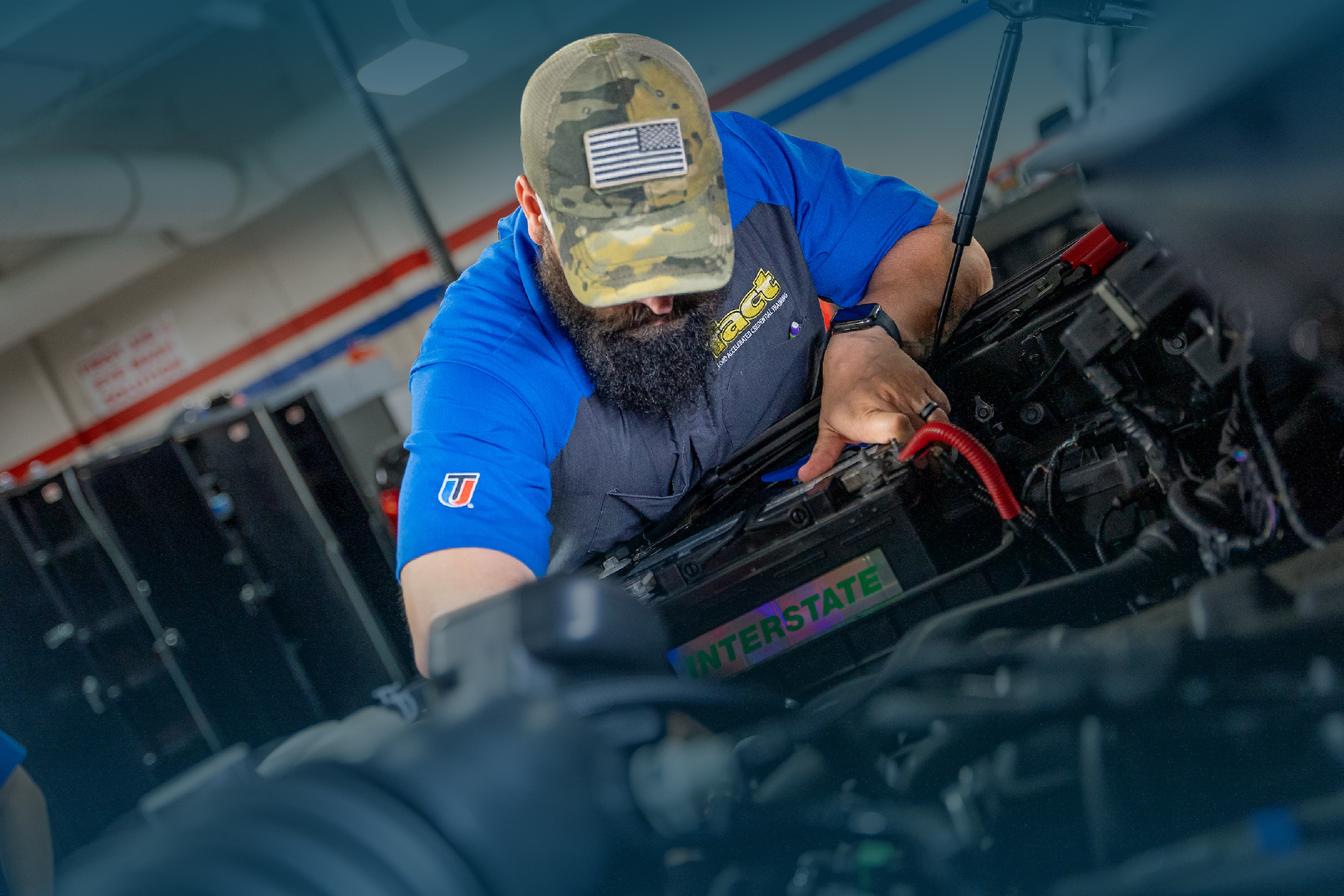 UTI tech working on engine