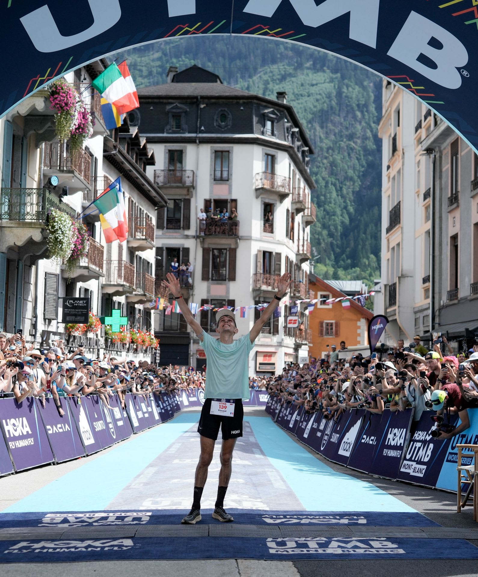 runner on the finish line of UTMB Mont blanc