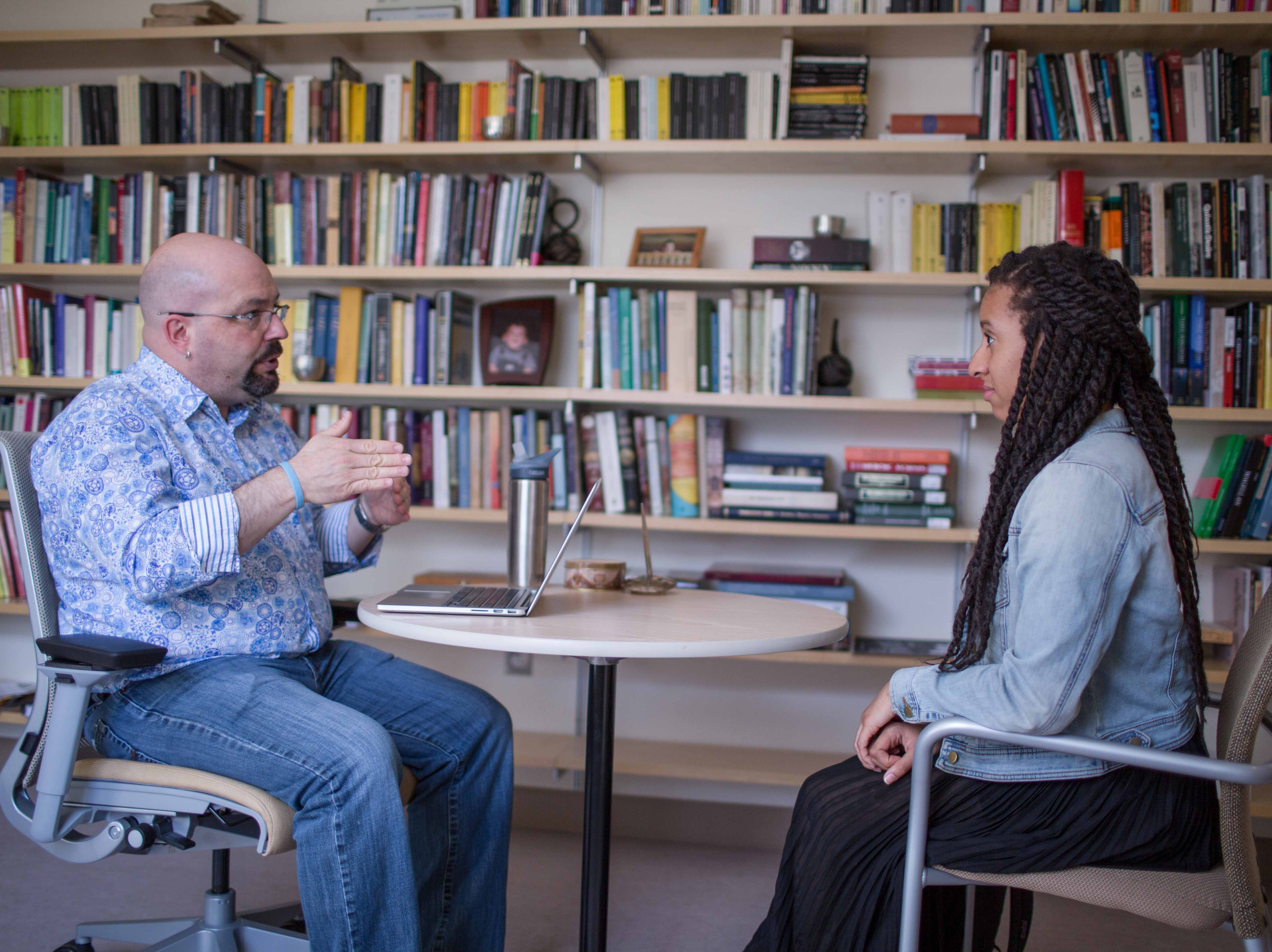 Staff member advising student