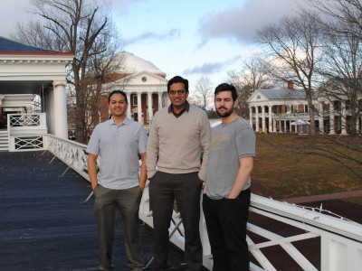 Three students standing in front of a Pavilion