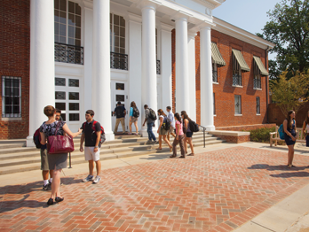 Students standing in front of Garrett Hall