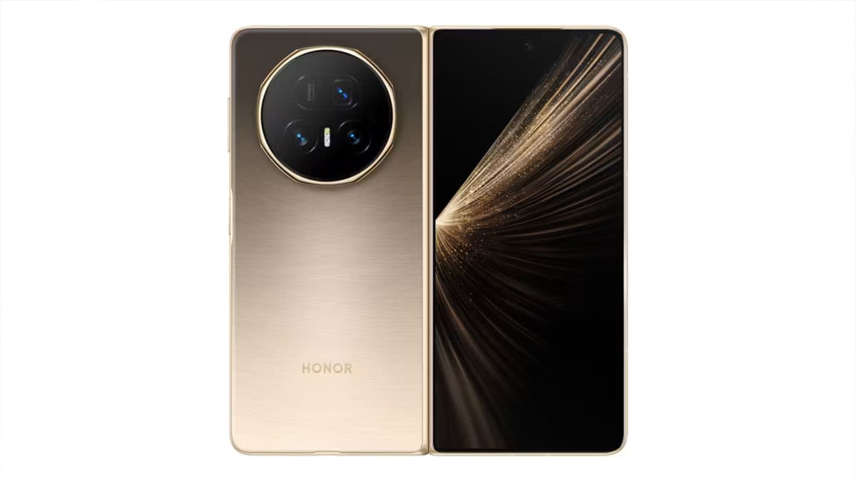 Honor Magic V5 foldable phone in Dawn Gold, shown from the back and unfolded