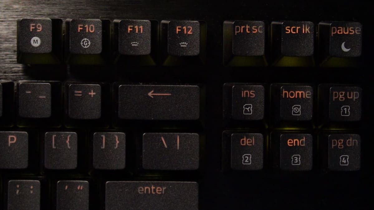 Close up of the function row and navigation cluster on the Razer Huntsman V3 HE Magnetic TKL, showing textured doubleshot PBT keycaps and secondary legends.