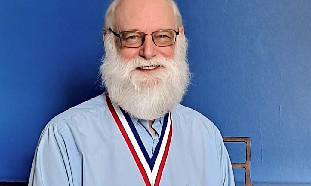 John Portrait 20210514 John Nelson smiling.