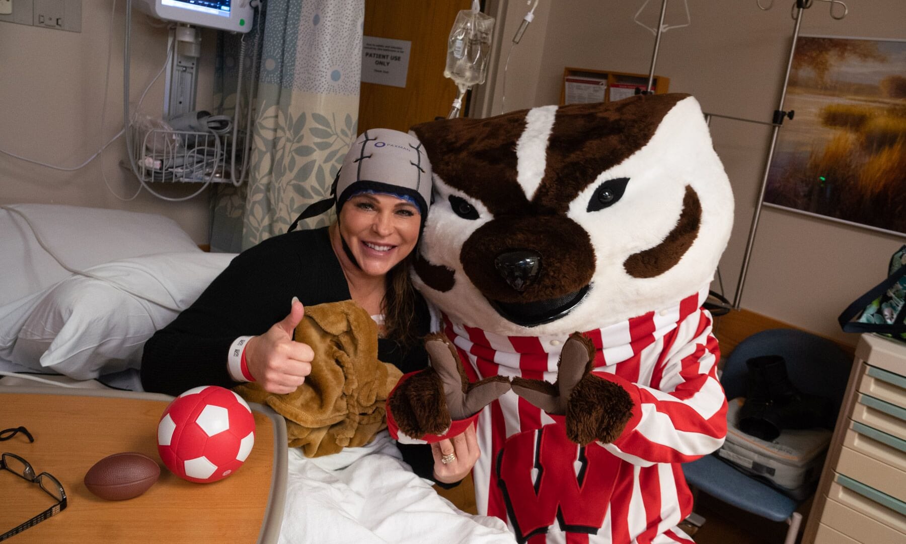 B6 Bucky 259348-1013.jpg DeeAnn Schmidt with Bucky Badger
