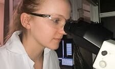Rebecca-225 Provider looking to microscope