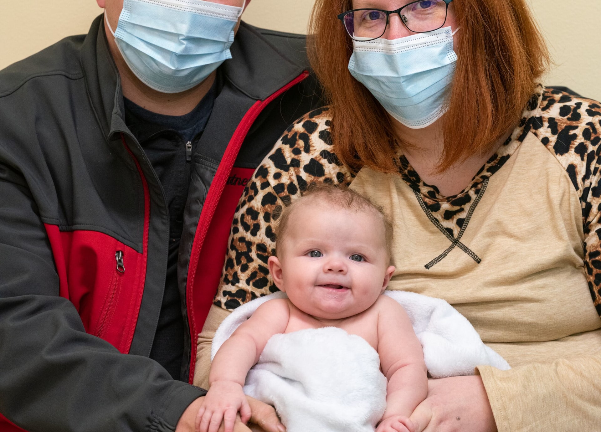 Riley 616636-2958 Parents with baby