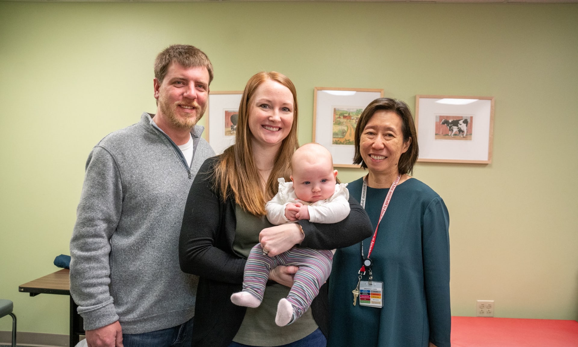 Piper 486304-9658.jpg Family with infant and physician