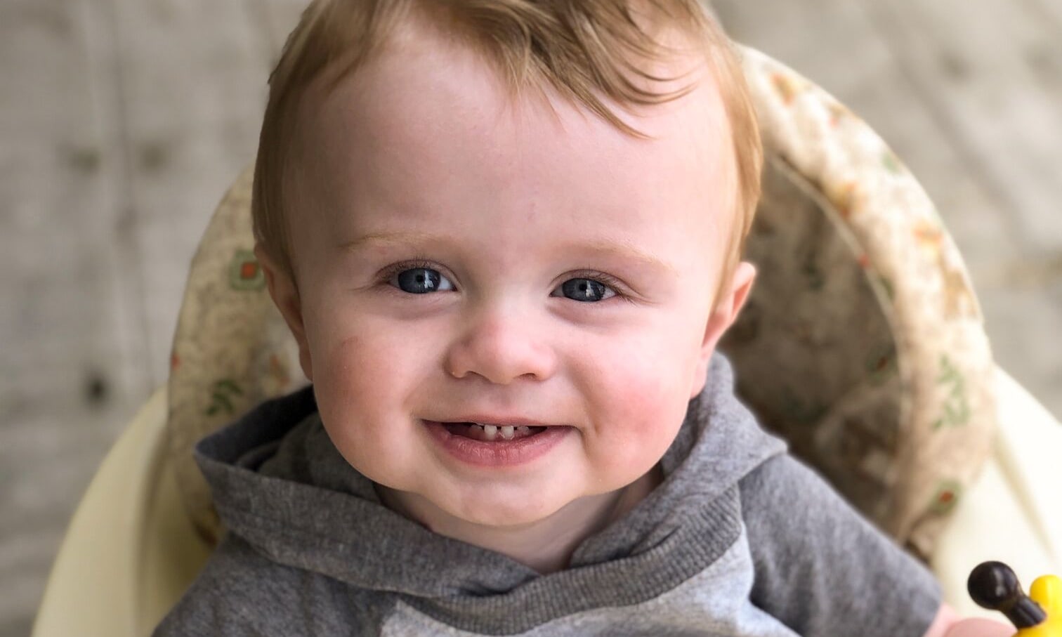 Boone A small child smiling