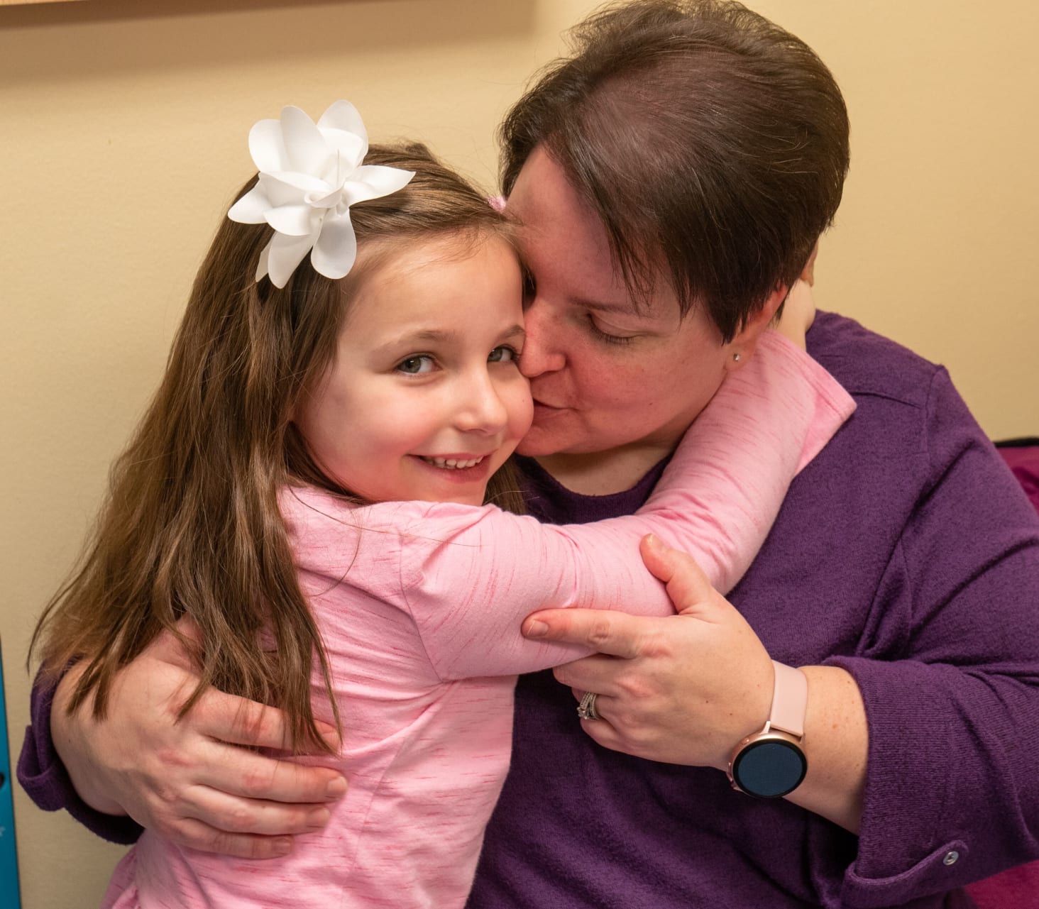 Paige Dill 453873-1853.jpg Pediatric patient hugging mom