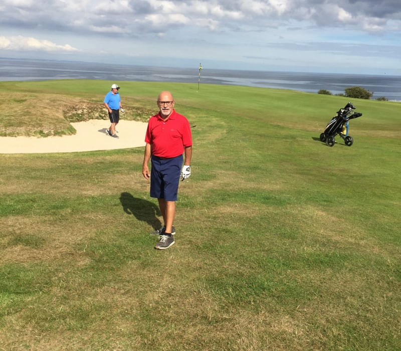John DeSimone.jpg Man on golfing range