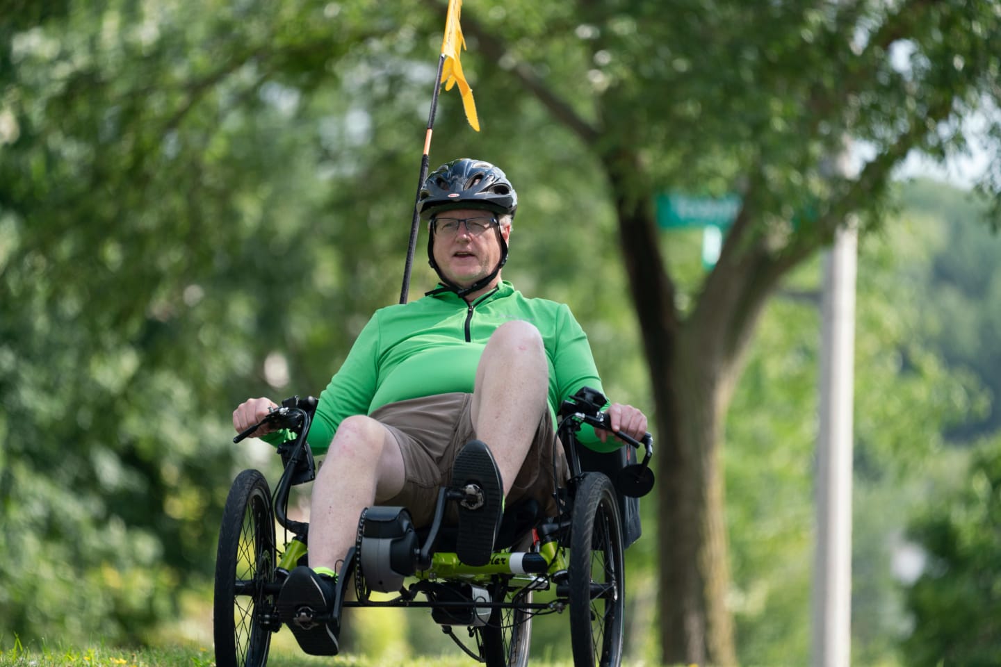 Mike Bradley riding his bike outdoors. He is now enjoying life again after a close call caused by a stroke.