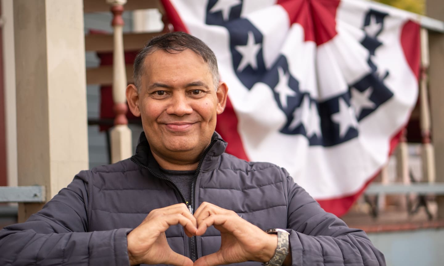 Sonny Torres holding his hands in the shape of a heart