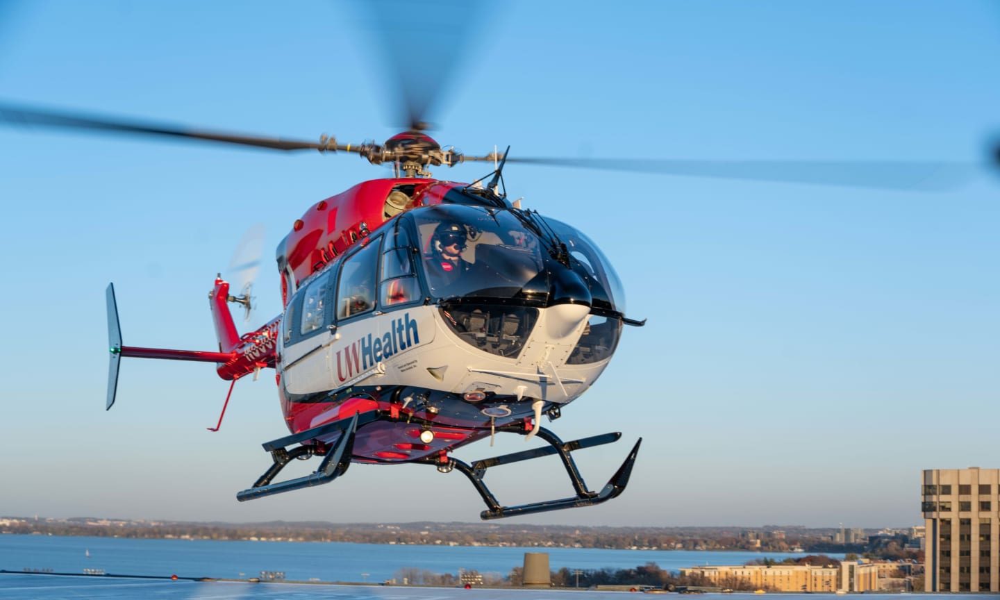 A UW Health Med Flight helicopter landing on a roof