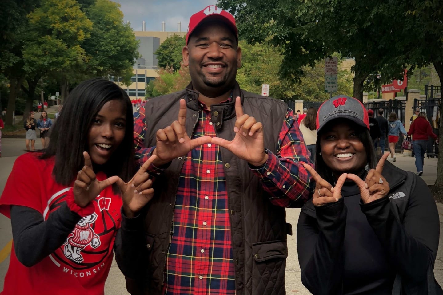 Jamila Hudson and her family show the Badger W