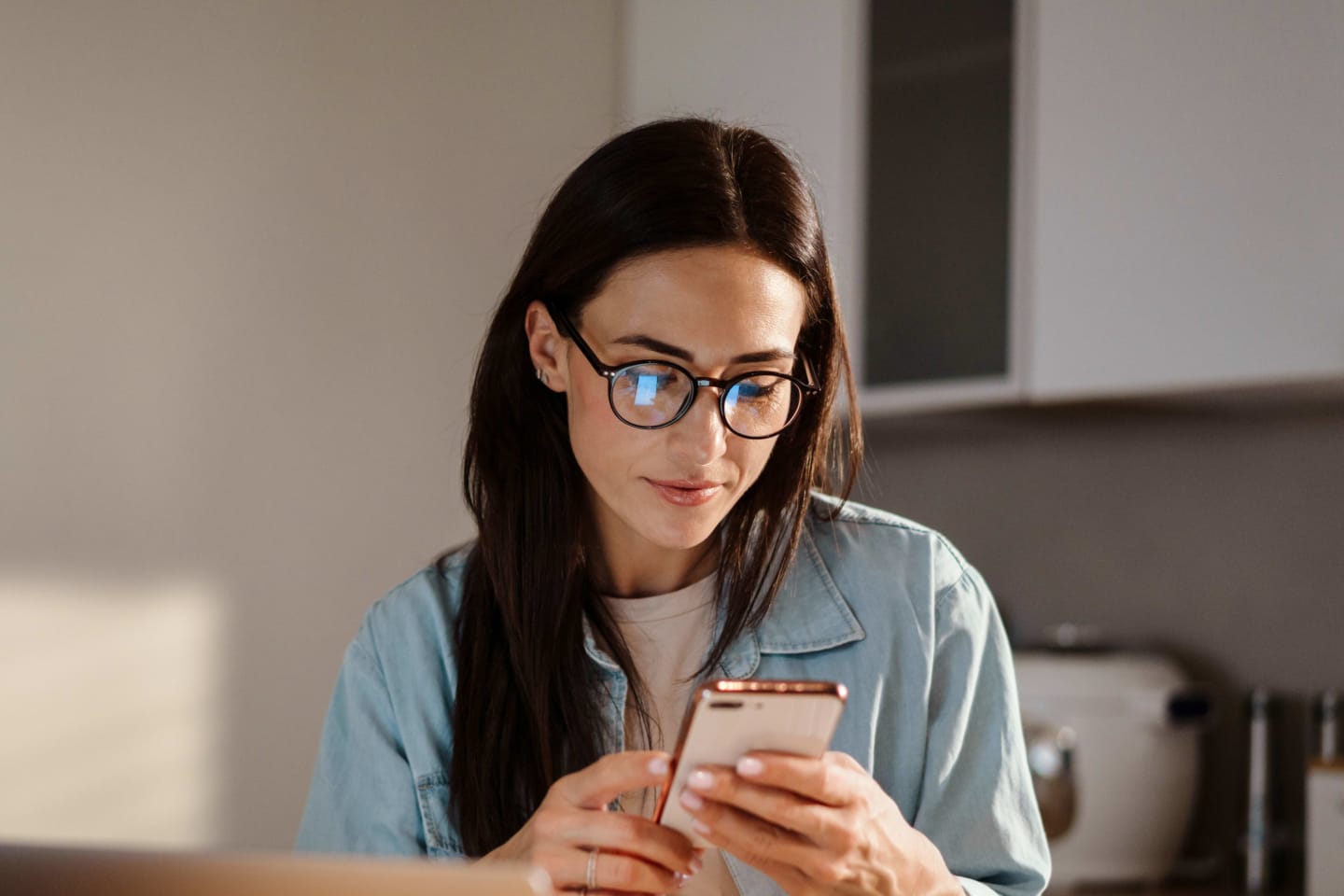 Woman looking at a mobile phone