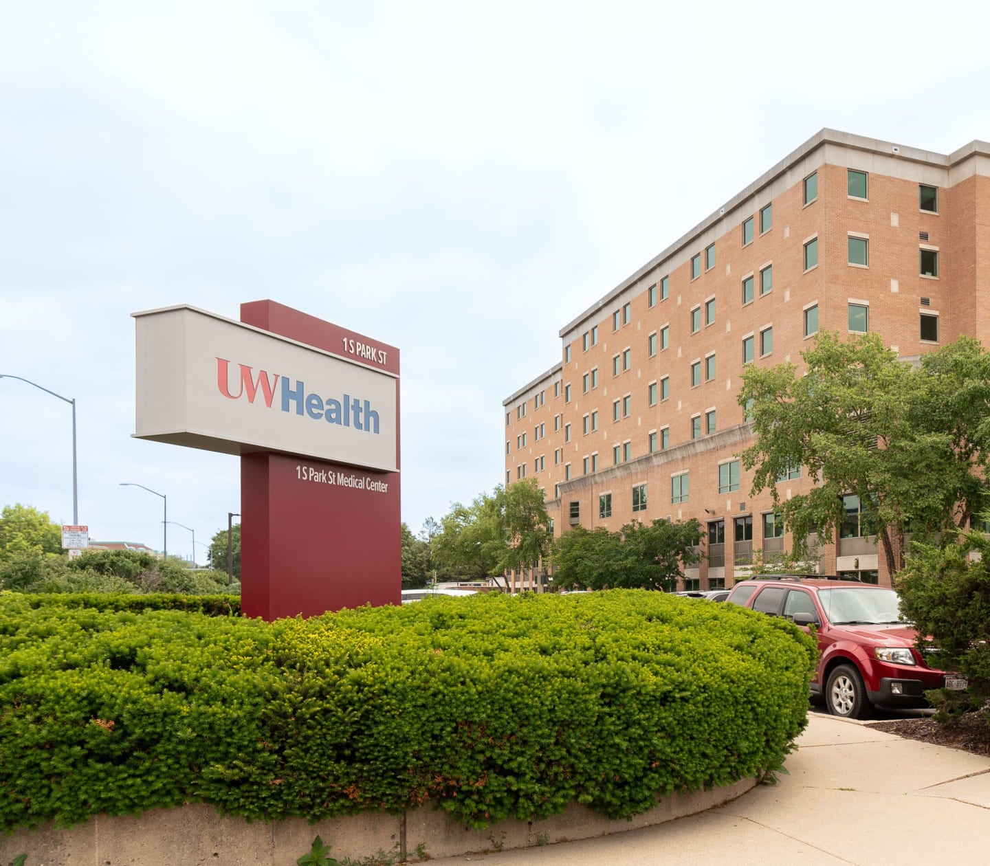 A wayfinding sign outside UW Health 1 S Park Street Clinic