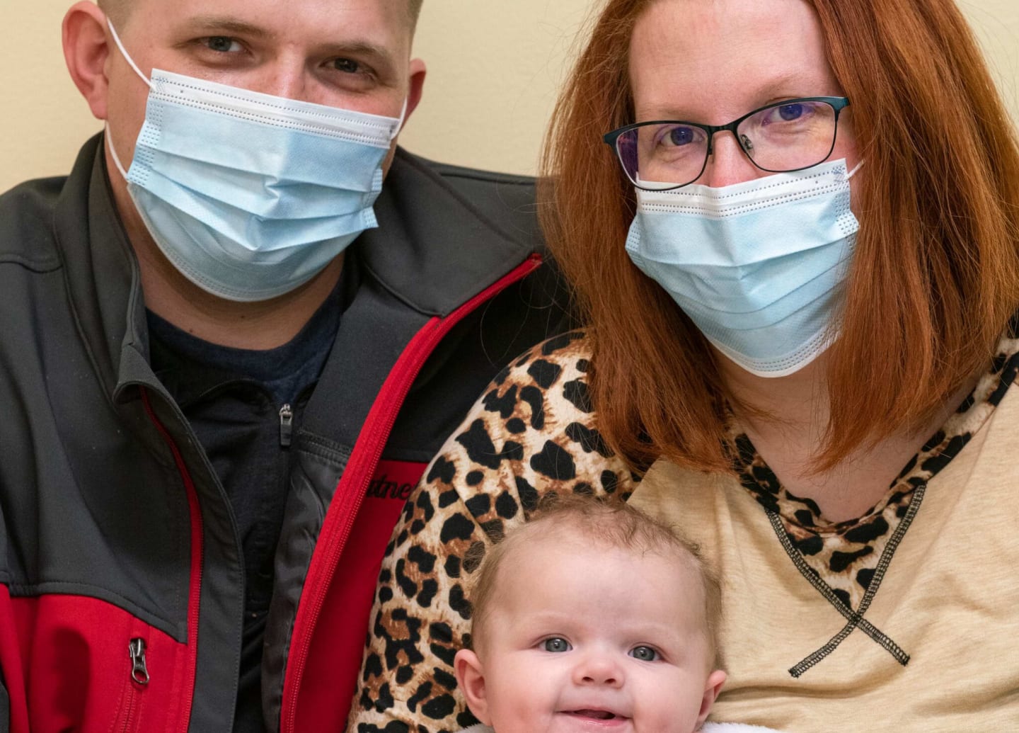 Ashley LaBeause, her husband Courtney and their child Riley