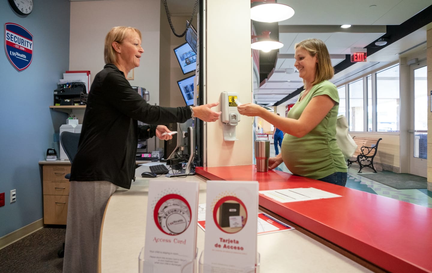 A patient being helped at a UW Health security desk