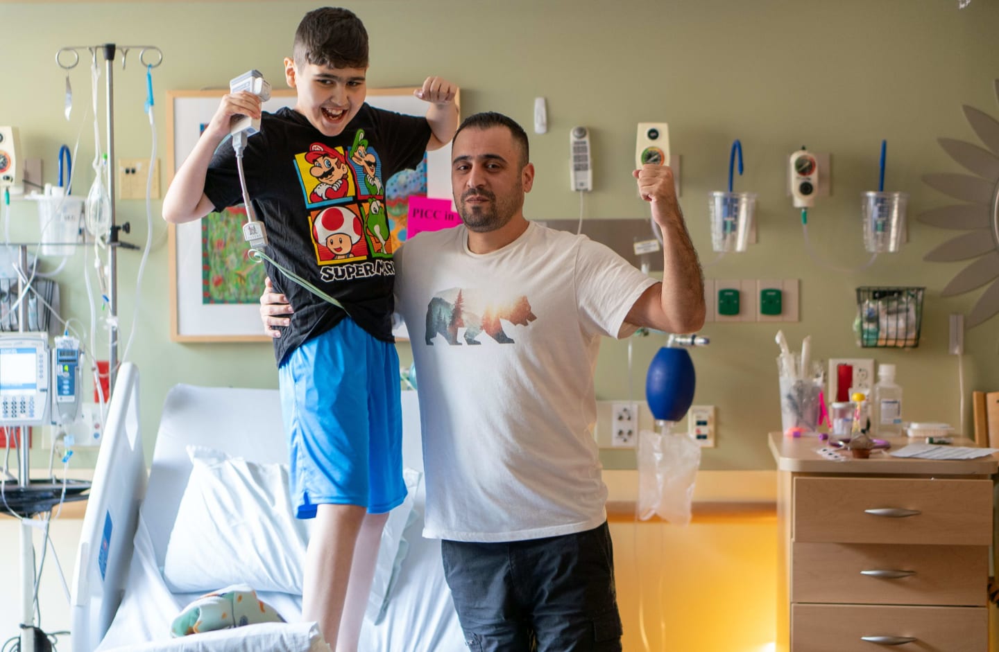 Sezar and his father Sam at American Family Children's Hospital