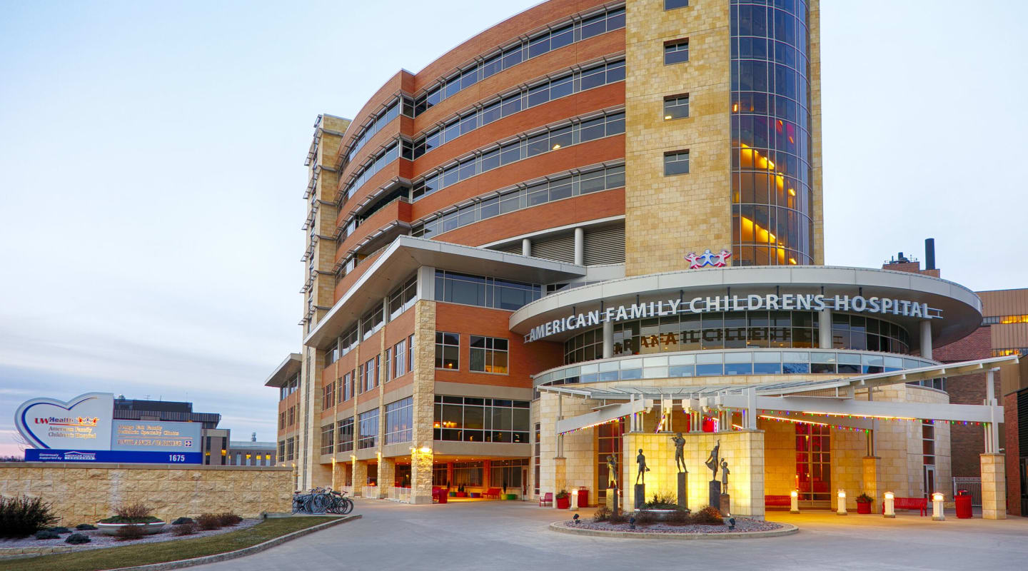 The main entrance of American Family Children's Hospital in the evening