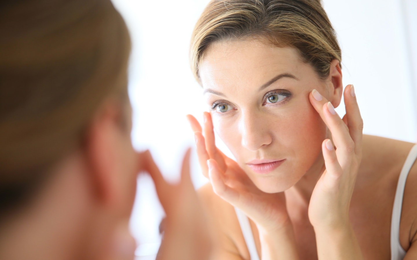 A person doing their makeup