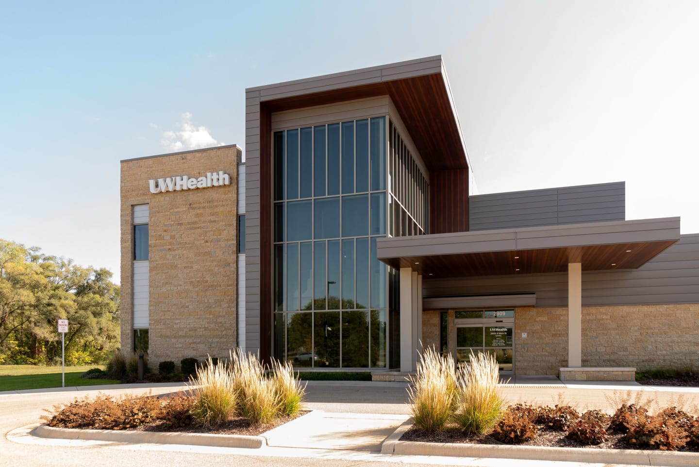 The gray, brick and glass exterior of the 2909 Main St Clinic