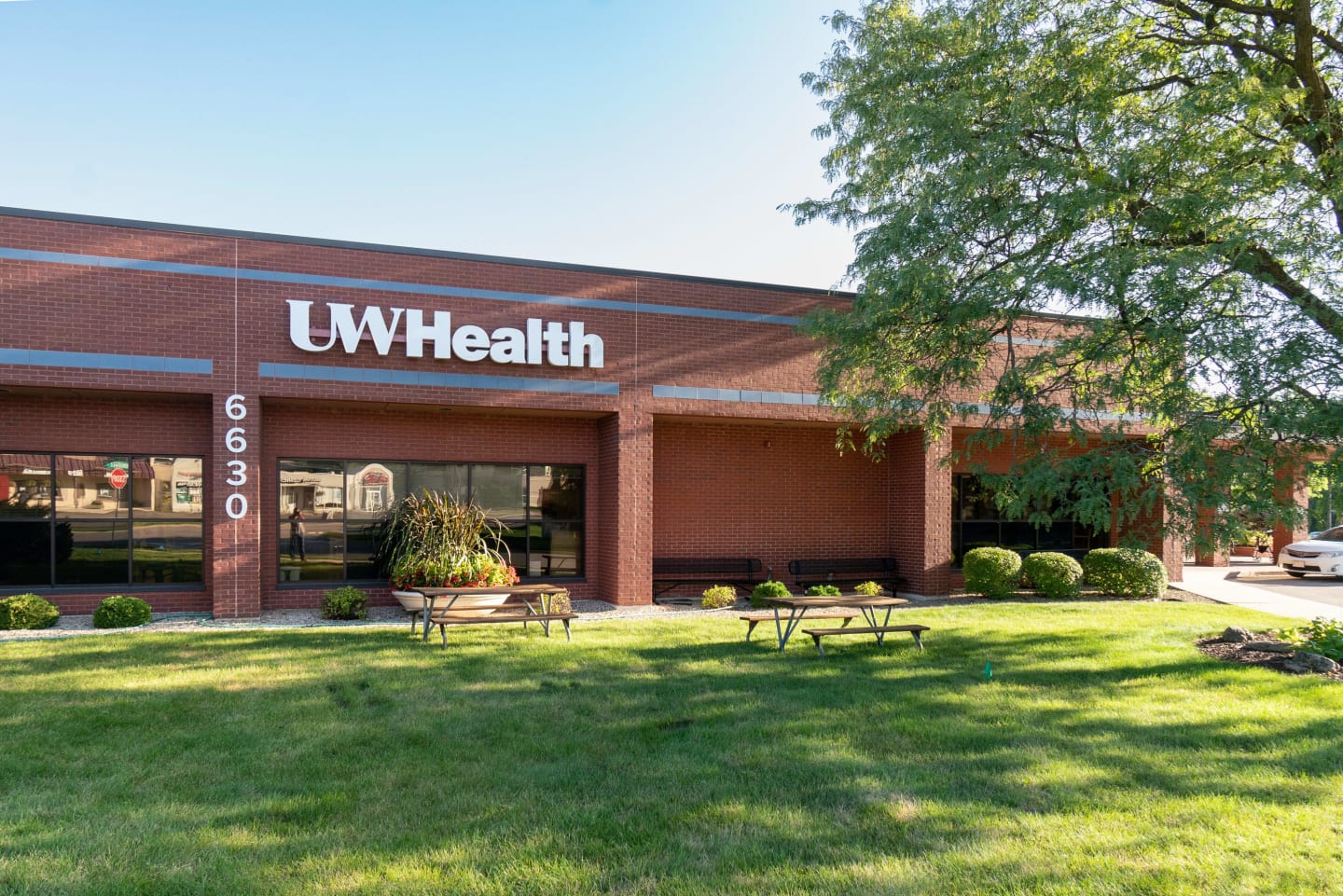 One story brick building with UW Health logo over the entrance.