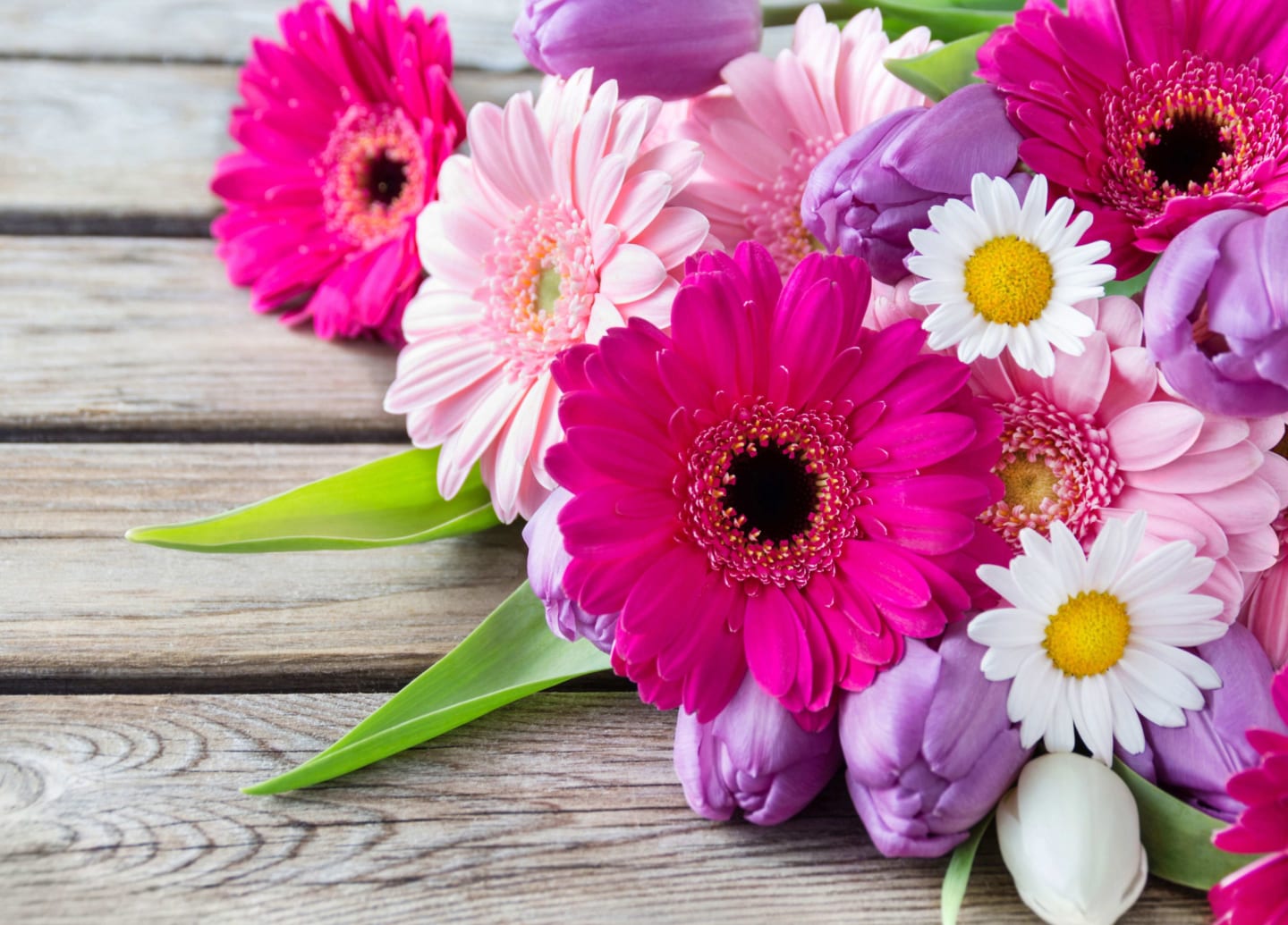 Bouquet of flowers against a wood background