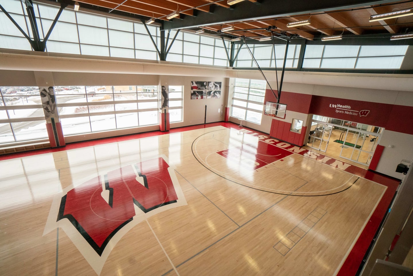 A basketball court with the Wisconsin "W" logo inside East Madison Hospital